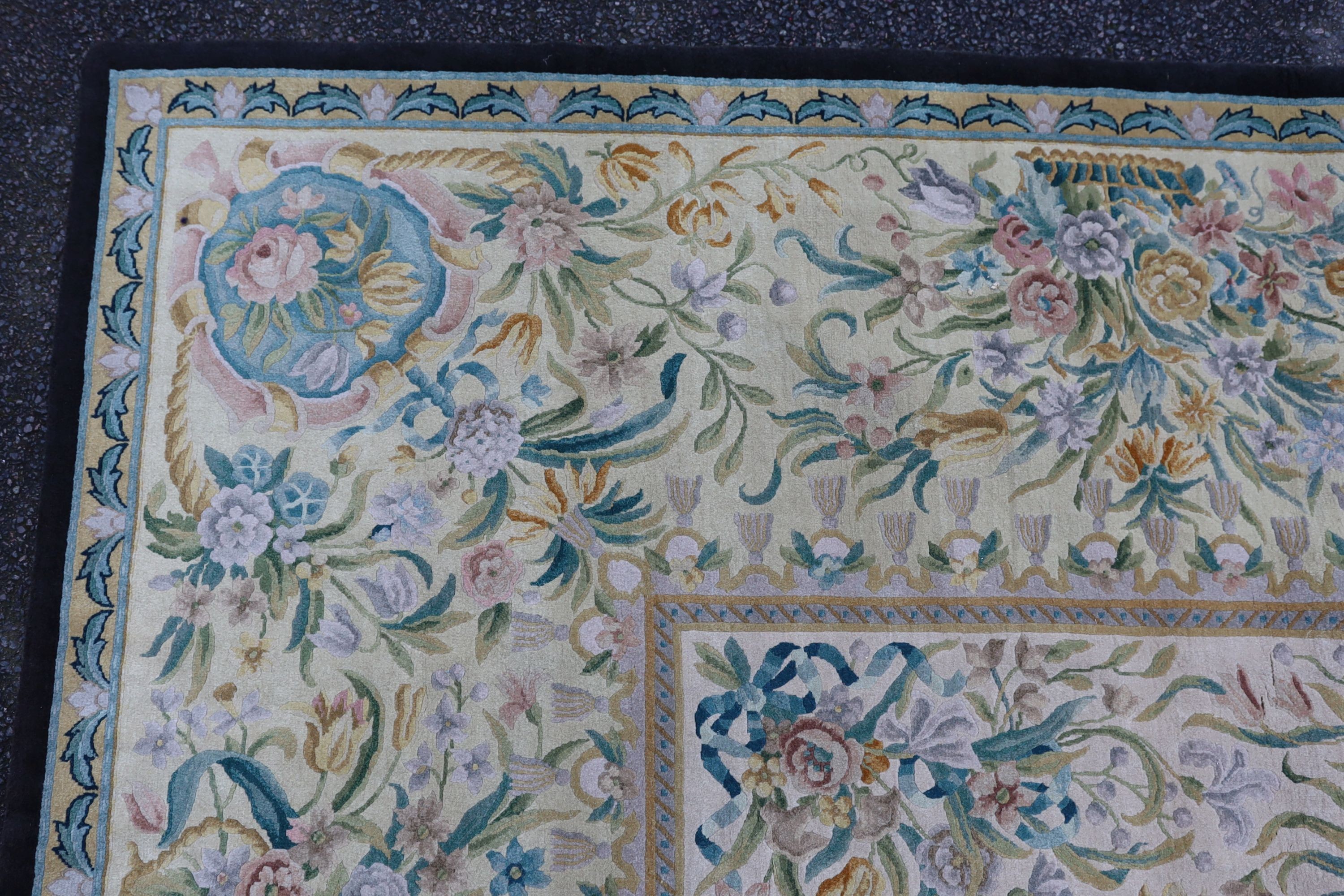 An Aubusson style ivory ground carpet, 372 x 274cm.